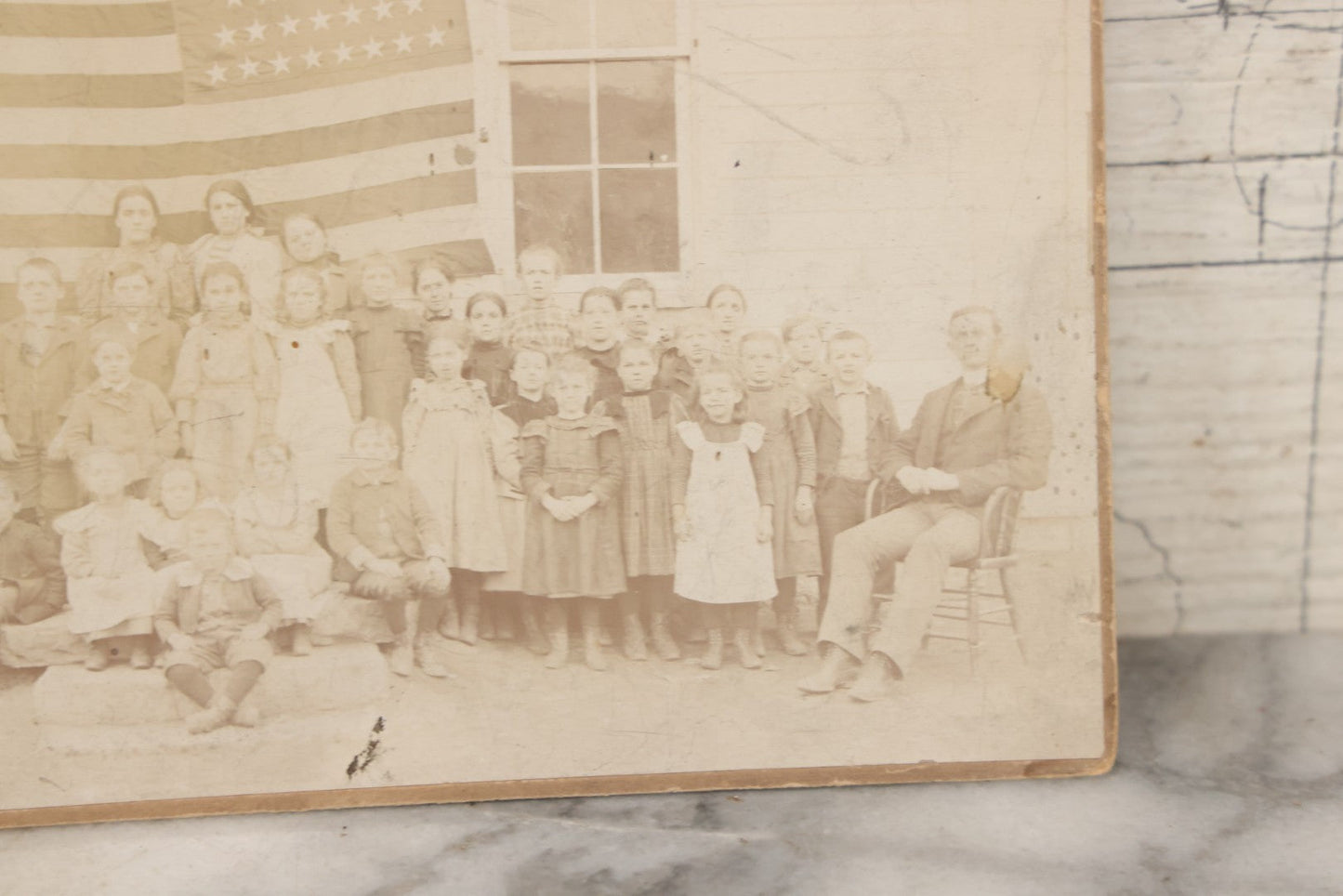 Lot 112 - Antique Boarded Photograph Of Western Pennsylvania School Class Posing In Front Of 44 Star American Flag With Teachers, Lenning & Thompson, Photographers, Martinsburg, Pennsylvania