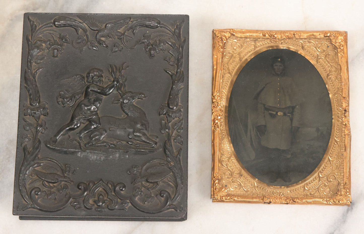 Lot 113 - Antique 1/4 Plate Tintype Photograph Of Civil War Era Soldier In Figural Thermoplastic Union Case With Cherub Battling Deer, Bird Adornments, Manufactured By Littlefield, Parsons, And Co., Note Photo Is Underexposed