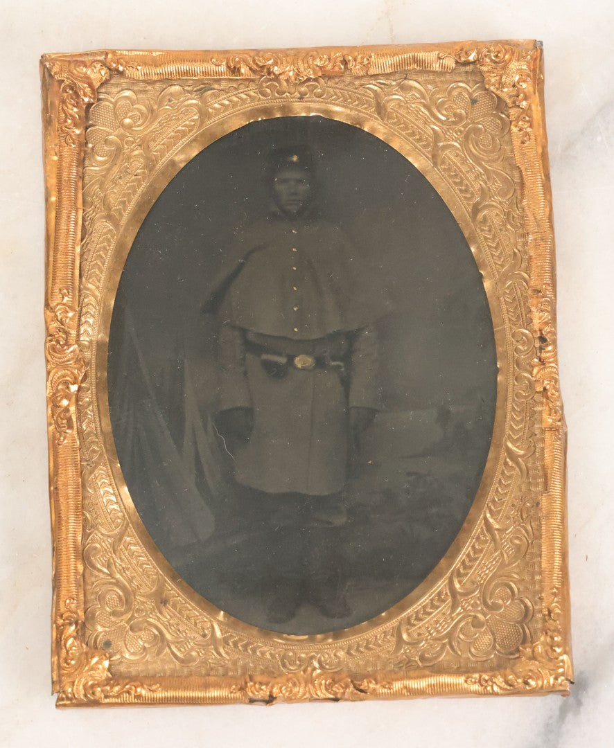 Lot 113 - Antique 1/4 Plate Tintype Photograph Of Civil War Era Soldier In Figural Thermoplastic Union Case With Cherub Battling Deer, Bird Adornments, Manufactured By Littlefield, Parsons, And Co., Note Photo Is Underexposed