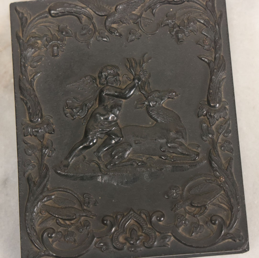 Lot 113 - Antique 1/4 Plate Tintype Photograph Of Civil War Era Soldier In Figural Thermoplastic Union Case With Cherub Battling Deer, Bird Adornments, Manufactured By Littlefield, Parsons, And Co., Note Photo Is Underexposed