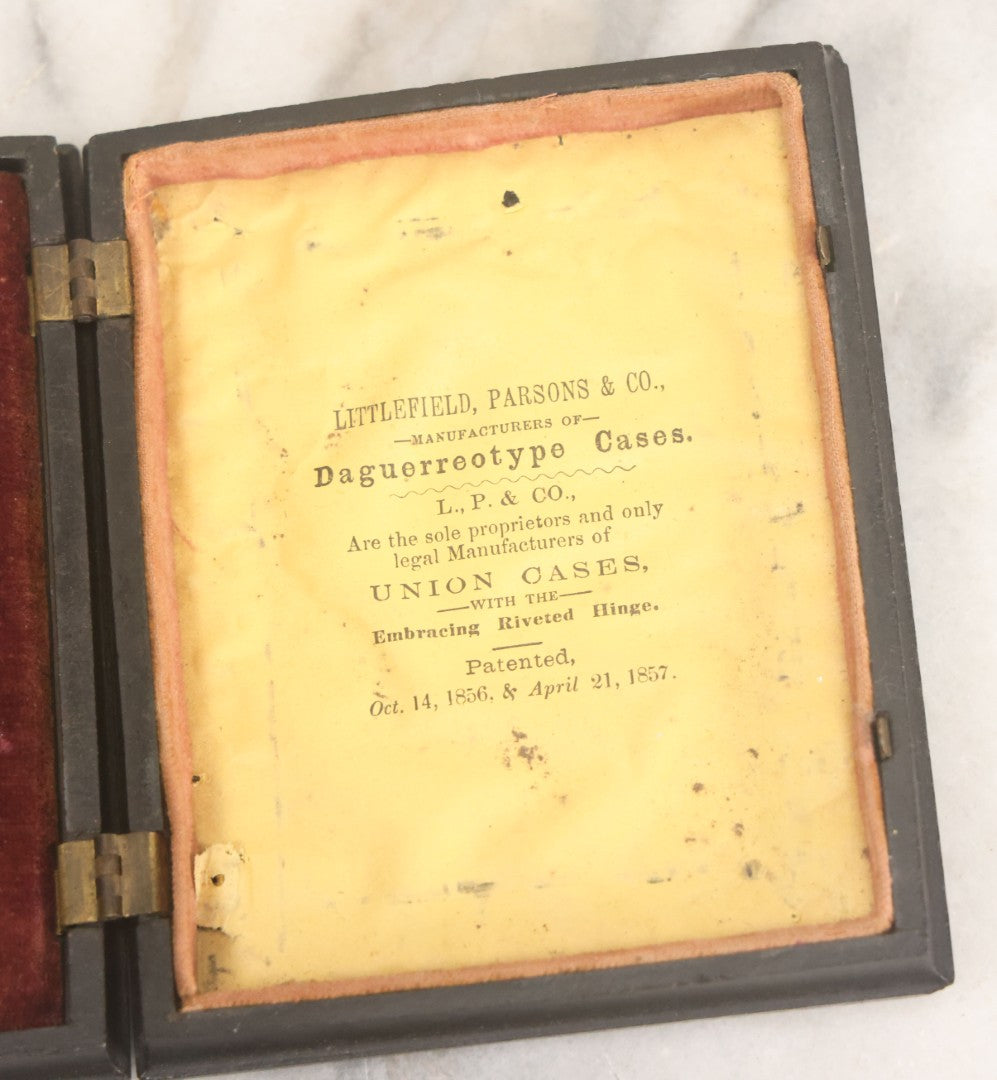 Lot 113 - Antique 1/4 Plate Tintype Photograph Of Civil War Era Soldier In Figural Thermoplastic Union Case With Cherub Battling Deer, Bird Adornments, Manufactured By Littlefield, Parsons, And Co., Note Photo Is Underexposed