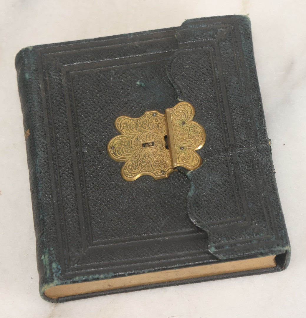 Lot 115 - Antique 1/6th Plate Daguerreotype Photograph Of Young Woman Wearing Black Lace Gloves And Large Brooch In Leatherette Folder Case With Latch, "Bijou" Lettering On Spine, Identified As Anna Matilda Blackledge, Note Partial Tear On Case Cover