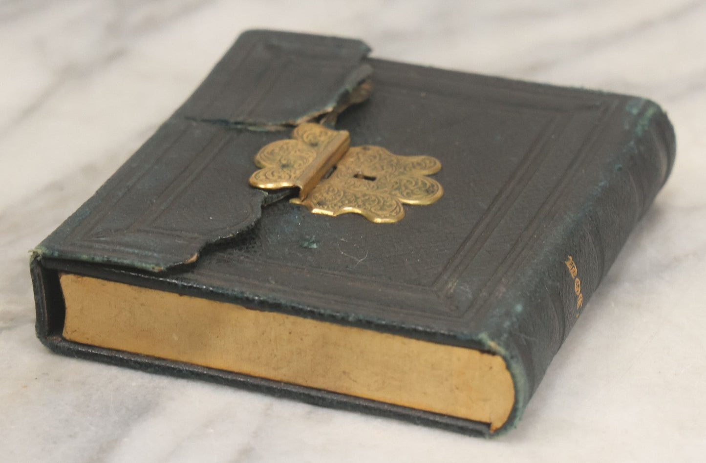 Lot 115 - Antique 1/6th Plate Daguerreotype Photograph Of Young Woman Wearing Black Lace Gloves And Large Brooch In Leatherette Folder Case With Latch, "Bijou" Lettering On Spine, Identified As Anna Matilda Blackledge, Note Partial Tear On Case Cover
