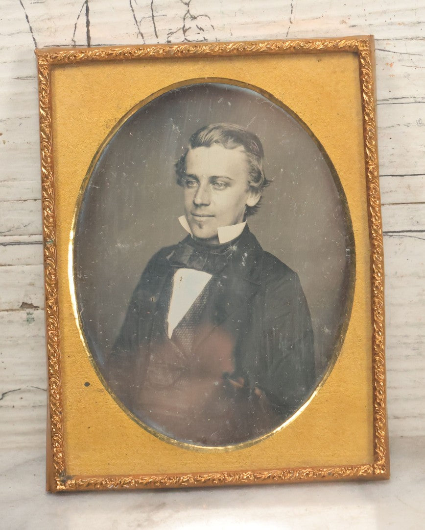 Lot 116 - Antique 1/4 Plate Daguerreotype Photograph Of Handsome Young Man With Slicked Back Hair, Soul Patch, In Suit, With Brass Mat, No Case