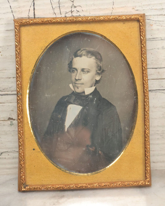 Lot 116 - Antique 1/4 Plate Daguerreotype Photograph Of Handsome Young Man With Slicked Back Hair, Soul Patch, In Suit, With Brass Mat, No Case