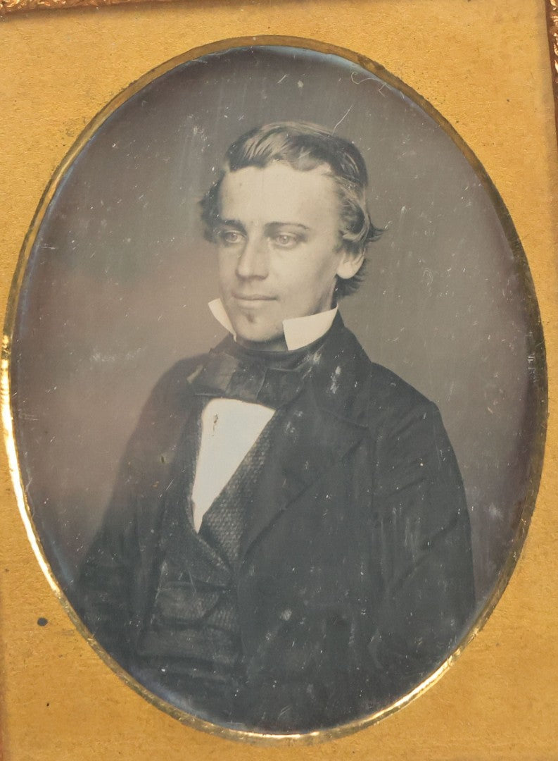 Lot 116 - Antique 1/4 Plate Daguerreotype Photograph Of Handsome Young Man With Slicked Back Hair, Soul Patch, In Suit, With Brass Mat, No Case
