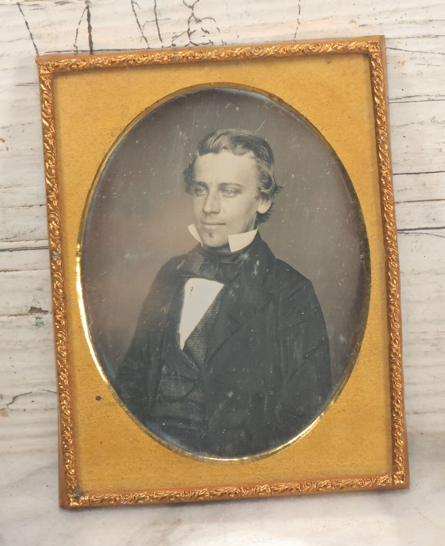 Lot 116 - Antique 1/4 Plate Daguerreotype Photograph Of Handsome Young Man With Slicked Back Hair, Soul Patch, In Suit, With Brass Mat, No Case