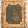 Lot 118 - Antique 1/6th Plate Ambrotype Photograph Of Young Girl In Off-The-Shoulders Dress Holding Period China Doll, Identified As Nettie L. Finch Edmonds, 1847-1936, In Full Split Leatherette Union Case