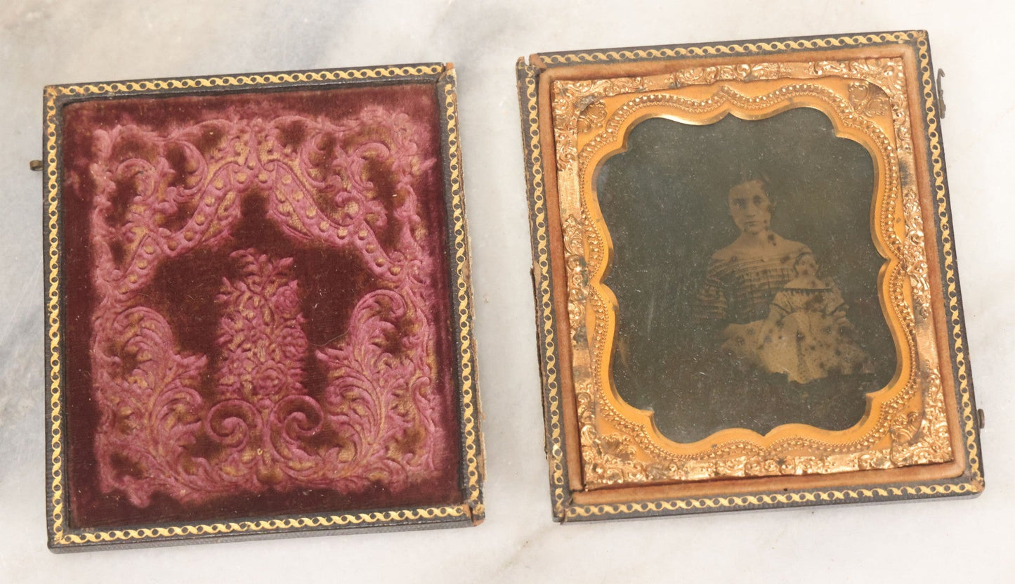 Lot 118 - Antique 1/6th Plate Ambrotype Photograph Of Young Girl In Off-The-Shoulders Dress Holding Period China Doll, Identified As Nettie L. Finch Edmonds, 1847-1936, In Full Split Leatherette Union Case