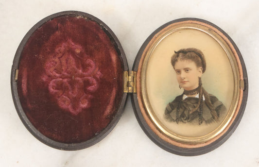 Lot 119 - Antique Color Painting Over Photograph Of Pretty Young Woman With Long Brown Hair, Dangly Earrings, In Figural Oval Thermoplastic Photo Case With Women, Baby And Dog