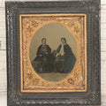 Lot 120 - Antique 1/6th Plate Tintype Photograph Of Two Ladies Seated At Table In Period Thermoplastic Frame With Hanging Hook, 4-1/8" x 4-5/8"