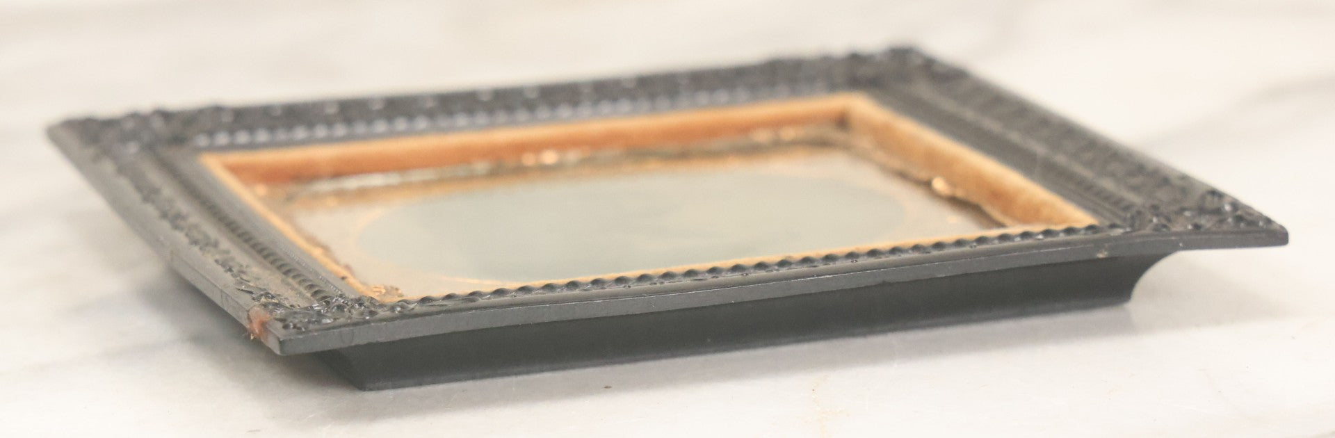 Lot 120 - Antique 1/6th Plate Tintype Photograph Of Two Ladies Seated At Table In Period Thermoplastic Frame With Hanging Hook, 4-1/8" x 4-5/8"