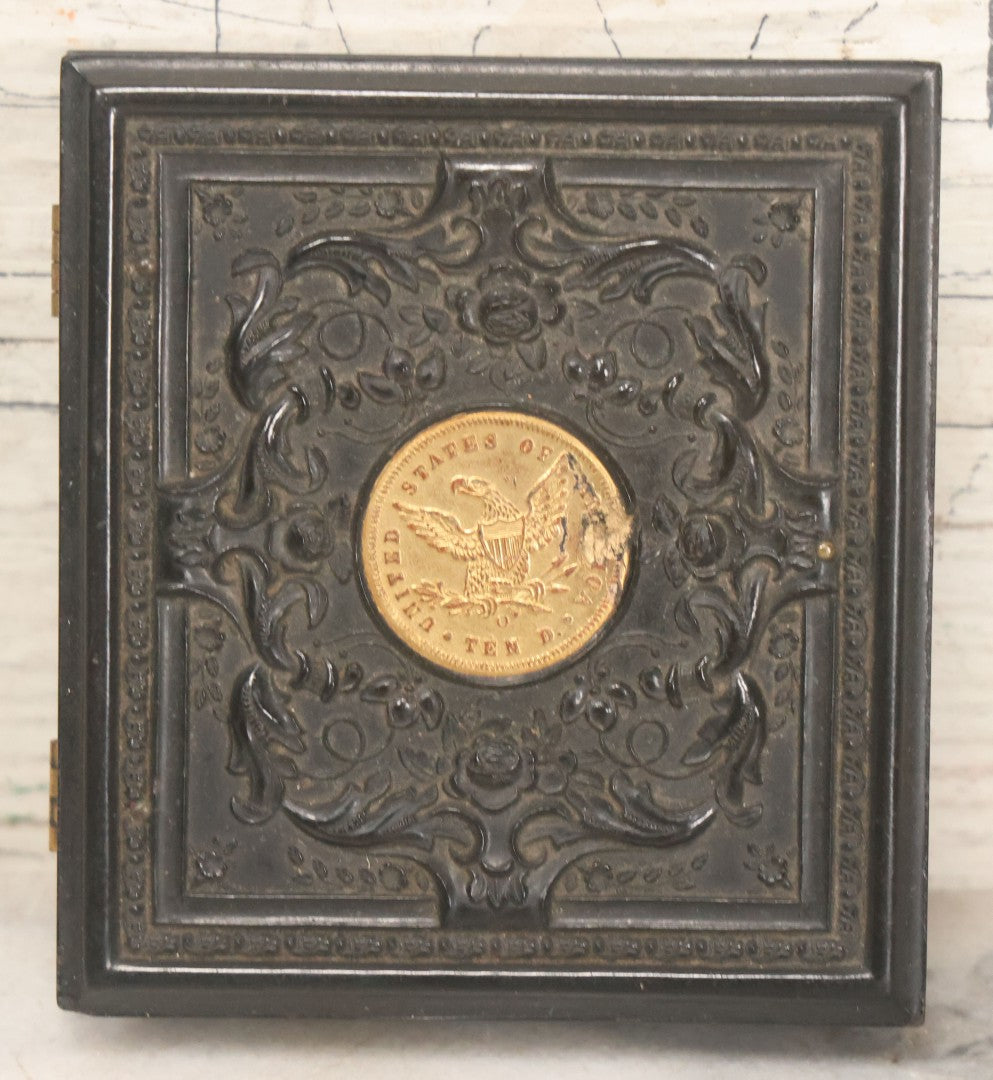 Lot 122 - Antique 1/6th Plate Hard Image Thermoplastic Case With Patriotic Motif, United States Of America Seal With Eagle, Faux Ten Dollar Coin, Genuine Union Case, By S. Peck & H. Halverson, Circa 1860