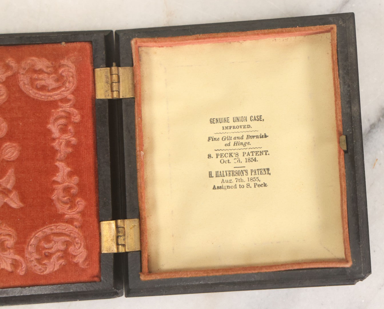 Lot 122 - Antique 1/6th Plate Hard Image Thermoplastic Case With Patriotic Motif, United States Of America Seal With Eagle, Faux Ten Dollar Coin, Genuine Union Case, By S. Peck & H. Halverson, Circa 1860