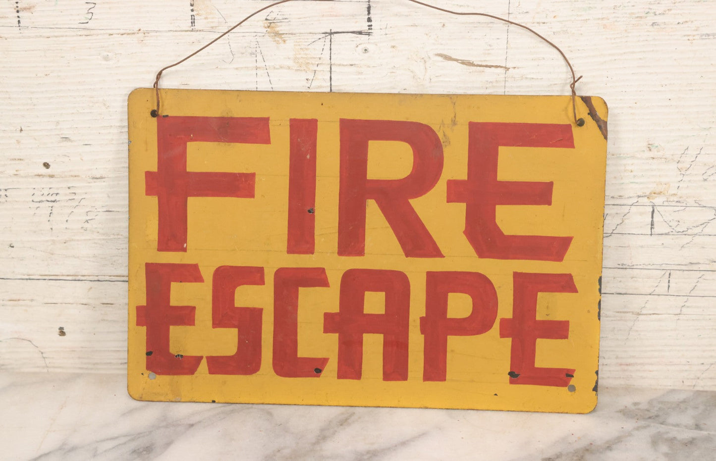Lot 019 - Vintage Hand Painted "Fire Escape" Tin Sign With Red Lettering On Yellow Field With Wire Hanger, 9-3/4" x 6-1/2"