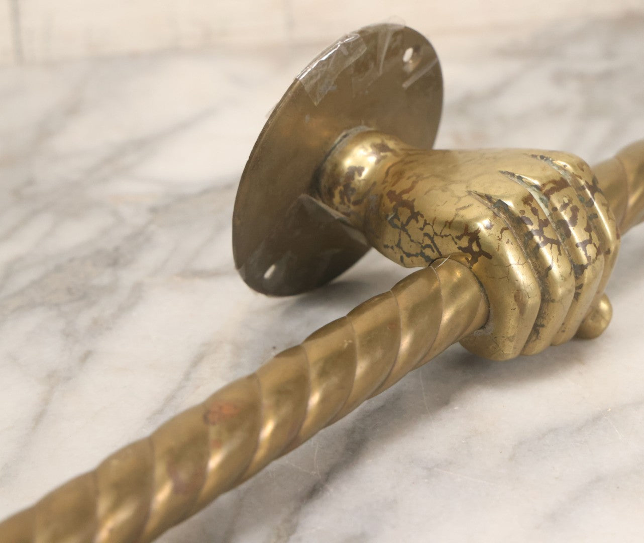 Lot 020 - Antique Solid Brass Center Mount Towel Rack With Fist Holding Pole Motif, Including Original Slotted Screw Mounting Hardware, 30" Length