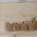 Lot 026 - Antique Cabinet Card Postmortem Photograph Of Young Girl On Funeral Table, Identified As Bernice Taylor, Granddaughter Of Arnold Johnson, From Meader's Art Studio, Williamston, Michigan