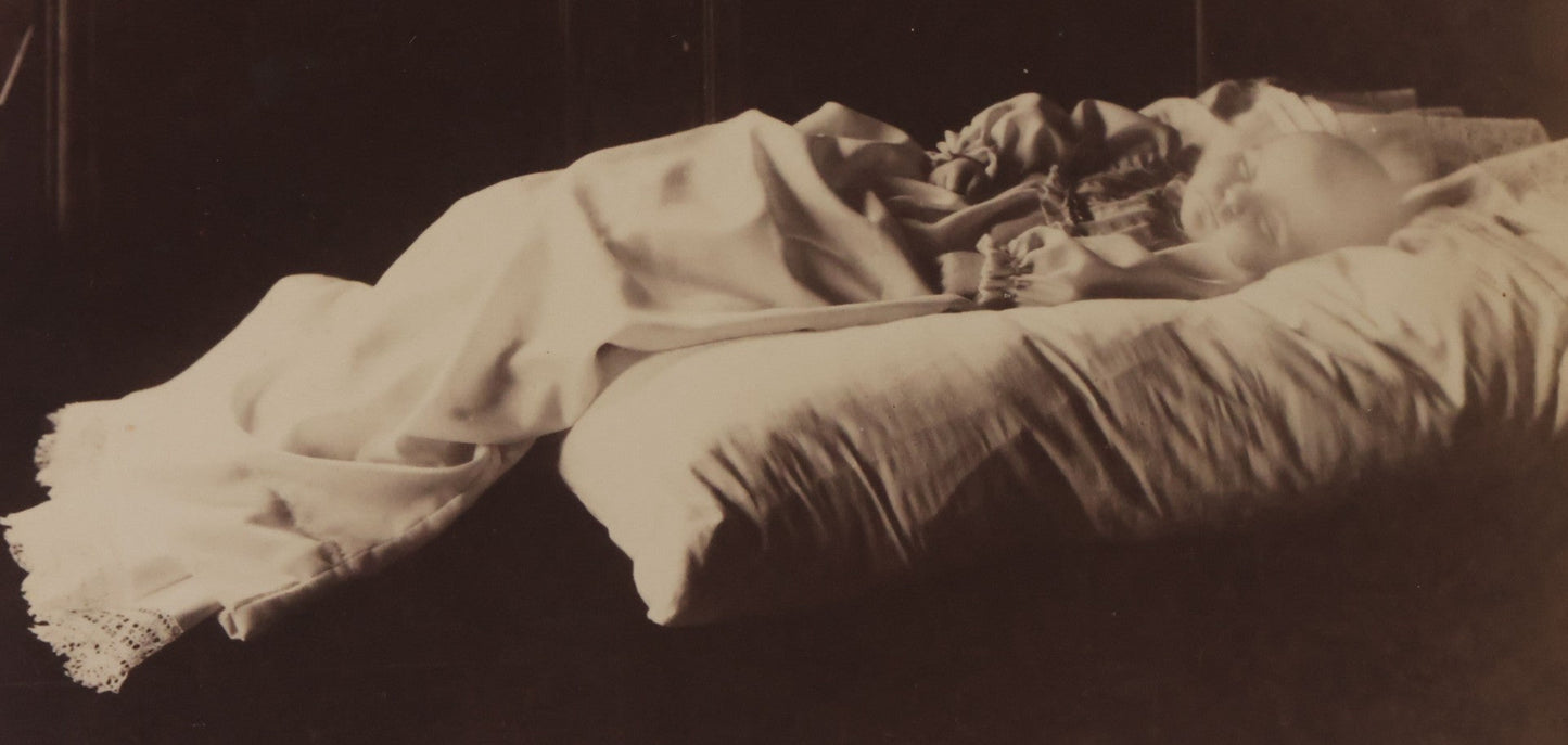 Lot 027 - Antique Cabinet Card Postmortem Photograph Of Baby Laying On Pillows With Dark Background, J.H. Langhans, Photographer, Little Valley, New York