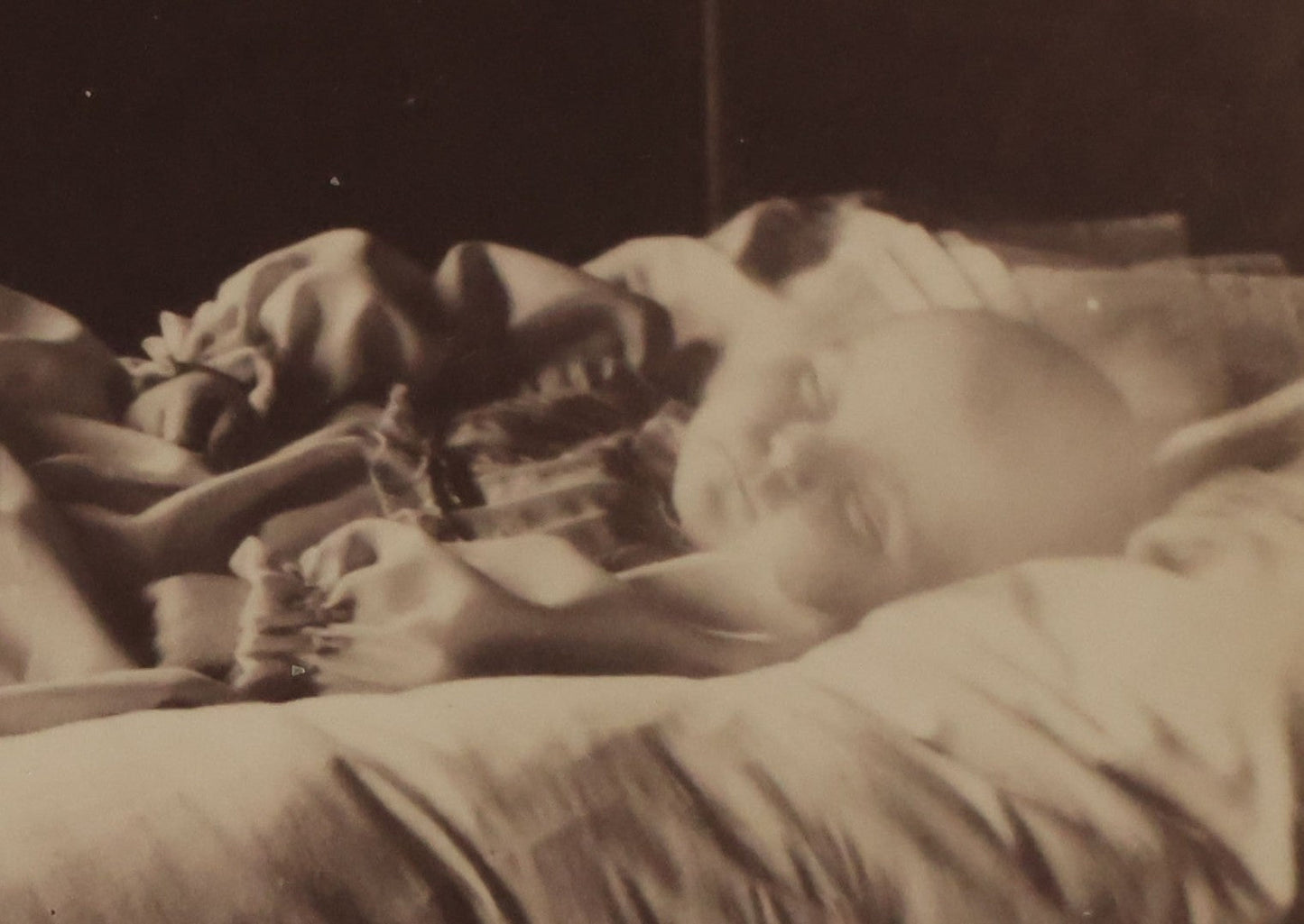 Lot 027 - Antique Cabinet Card Postmortem Photograph Of Baby Laying On Pillows With Dark Background, J.H. Langhans, Photographer, Little Valley, New York