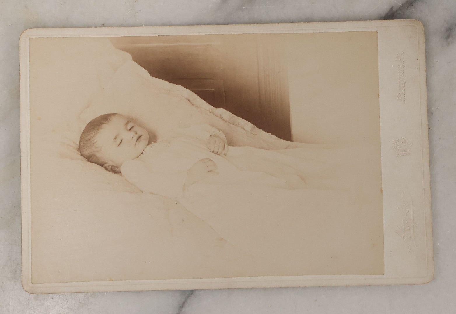 Lot 028 - Antique Cabinet Card Postmortem Photograph Of Baby In White, Laid Out On White Linens, Hafer, Photographer, Reading Pennsylvania