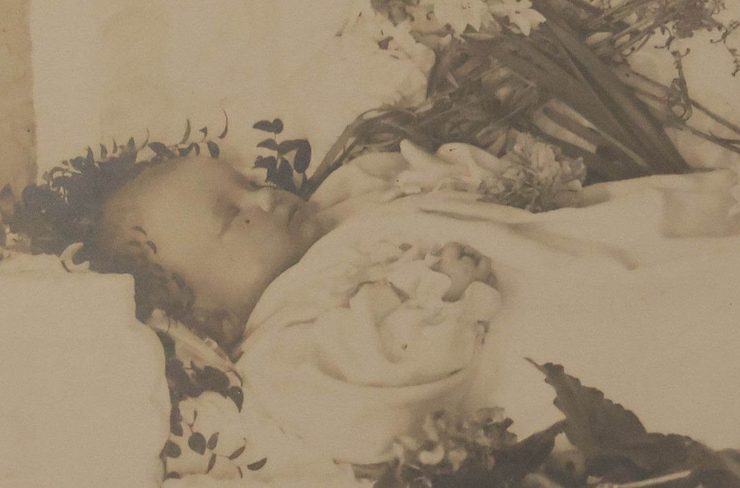 Lot 029 - Antique Boarded Post Mortem Photograph Of Baby In White Childs Coffin With Flowers