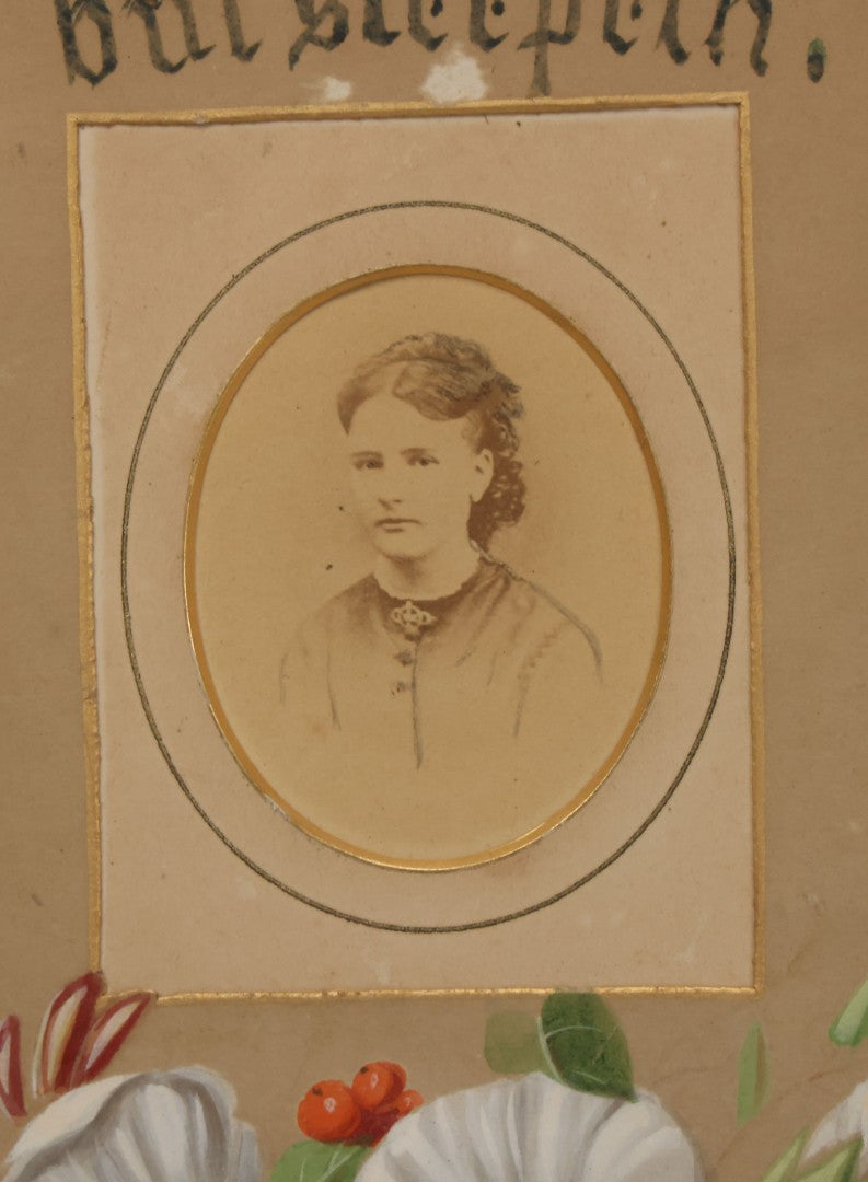 Lot 031 - Antique Mourning Art Painted Mat Photo Frame With Carte De Visite C.D.V. Photograph Of Woman, "She Is Not Dead But Sleepeth", Painting Of Flowers, 14-5/8" x 12-1/8"