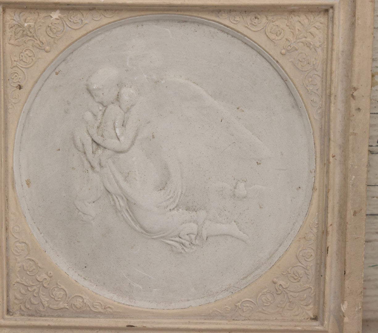 Lot 033 - Antique White Ceramic Wall Plaque Featuring A Guardian Angel Carrying Two Babies, With An Owl In Flight In The Background, 6-7/8" Sides