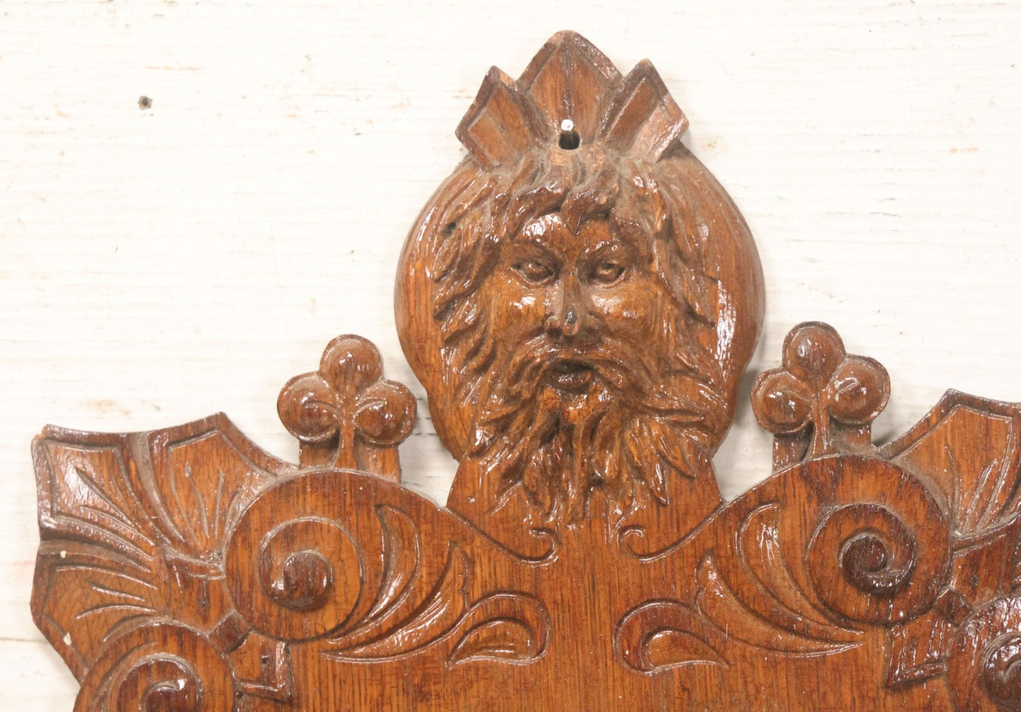 Lot 043 - Antique Hand Carved Black Forest Style Wall Pocket Plaque With Greenman Face Motif, Likely European, Baroque And Rococo Influenced Design, 8-3/4" x 11-7/8"