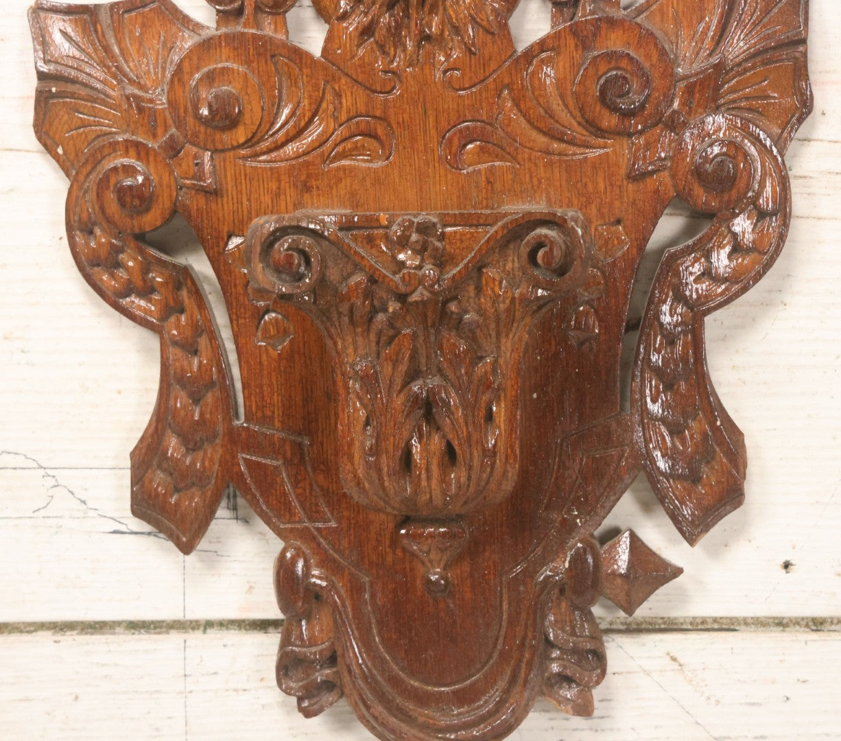 Lot 043 - Antique Hand Carved Black Forest Style Wall Pocket Plaque With Greenman Face Motif, Likely European, Baroque And Rococo Influenced Design, 8-3/4" x 11-7/8"