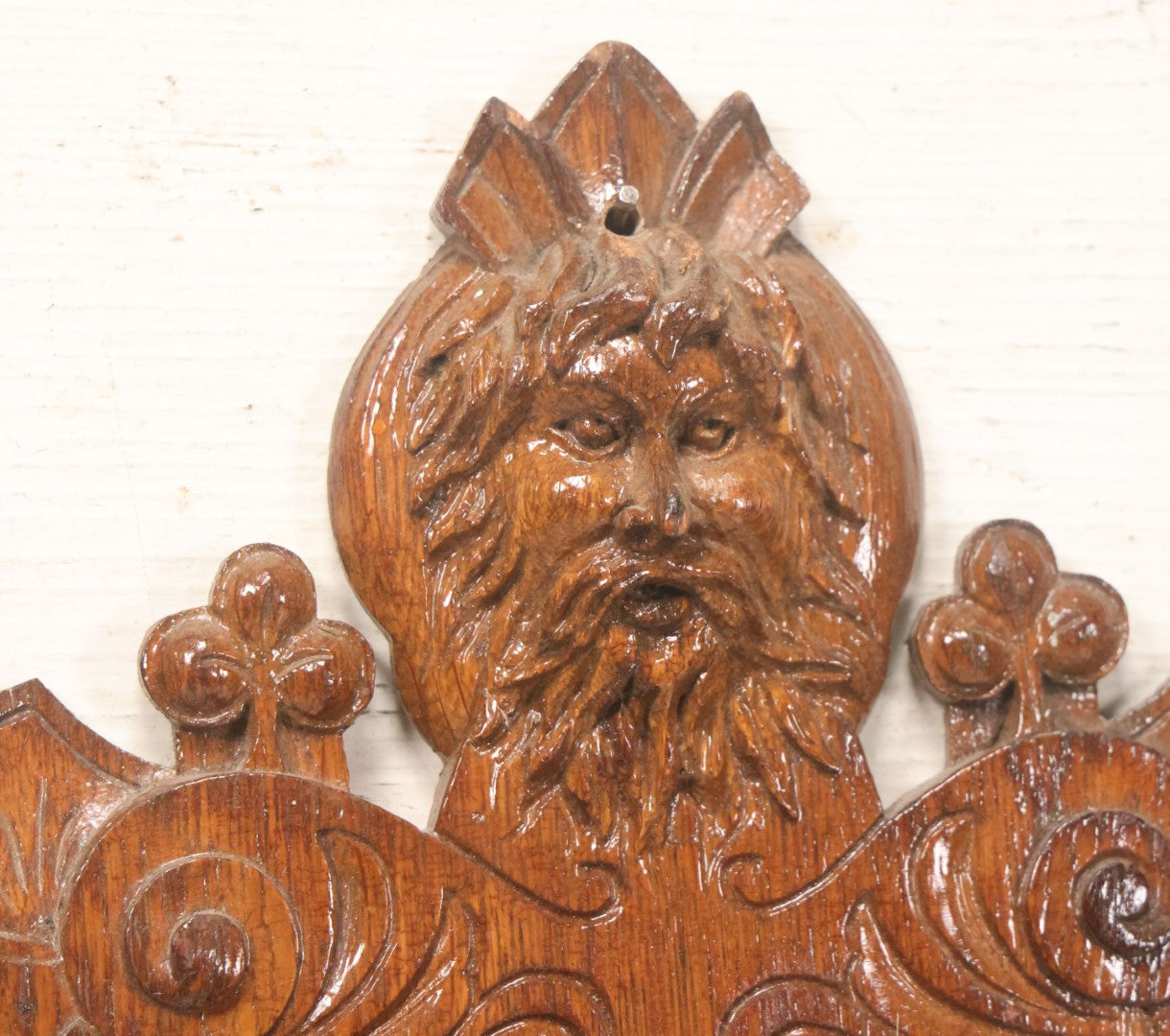 Lot 043 - Antique Hand Carved Black Forest Style Wall Pocket Plaque With Greenman Face Motif, Likely European, Baroque And Rococo Influenced Design, 8-3/4" x 11-7/8"