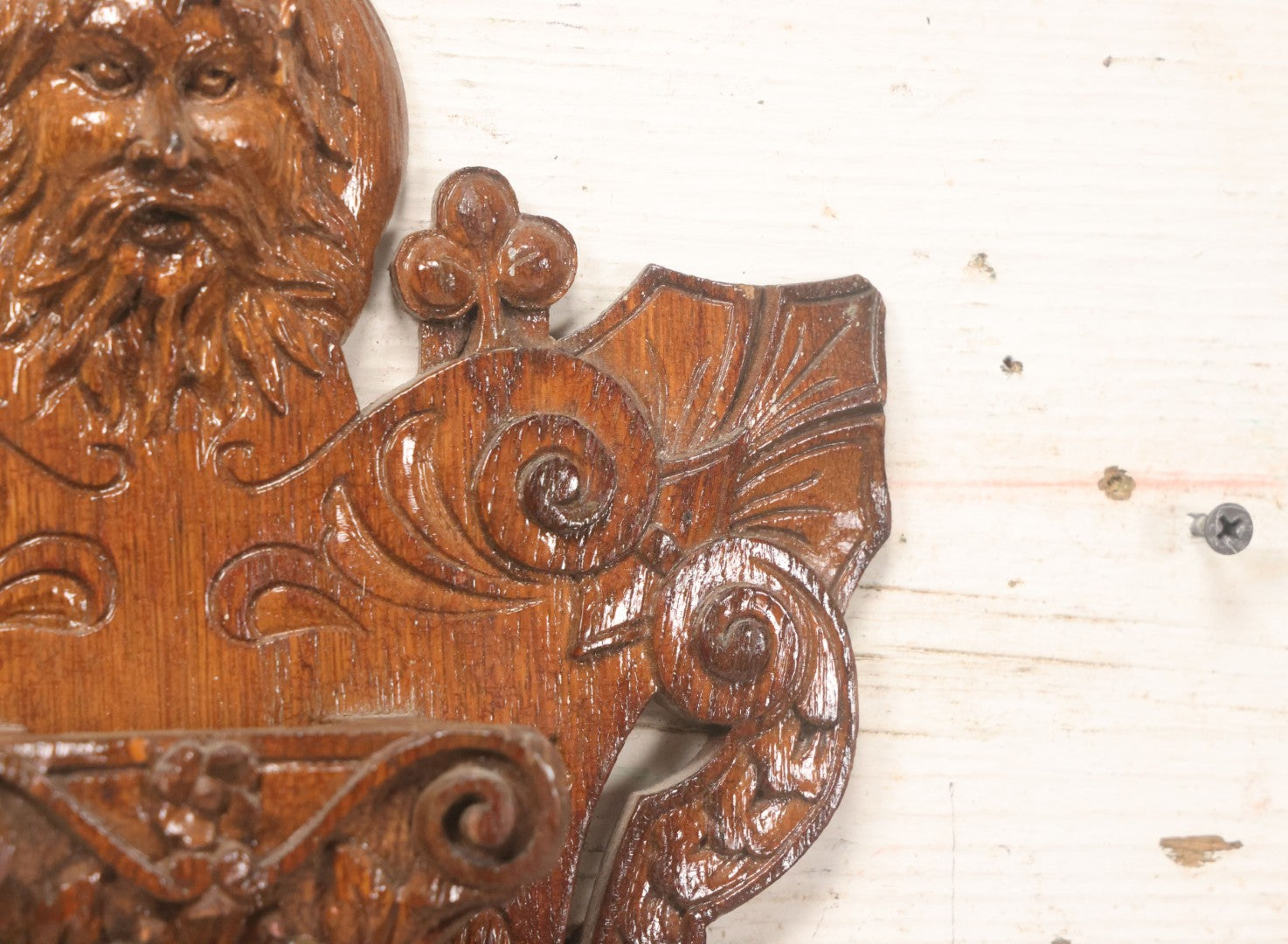 Lot 043 - Antique Hand Carved Black Forest Style Wall Pocket Plaque With Greenman Face Motif, Likely European, Baroque And Rococo Influenced Design, 8-3/4" x 11-7/8"