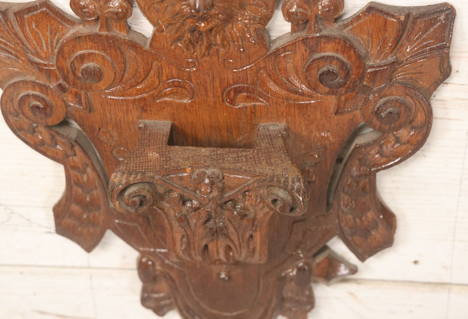 Lot 043 - Antique Hand Carved Black Forest Style Wall Pocket Plaque With Greenman Face Motif, Likely European, Baroque And Rococo Influenced Design, 8-3/4" x 11-7/8"