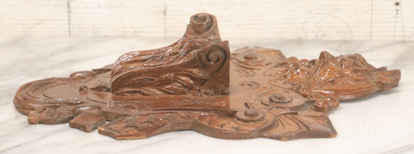 Lot 043 - Antique Hand Carved Black Forest Style Wall Pocket Plaque With Greenman Face Motif, Likely European, Baroque And Rococo Influenced Design, 8-3/4" x 11-7/8"