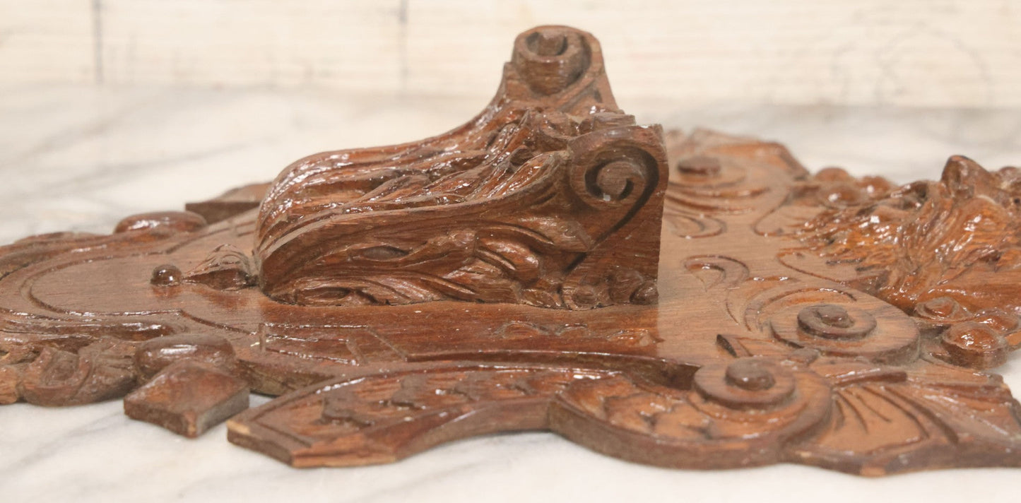 Lot 043 - Antique Hand Carved Black Forest Style Wall Pocket Plaque With Greenman Face Motif, Likely European, Baroque And Rococo Influenced Design, 8-3/4" x 11-7/8"