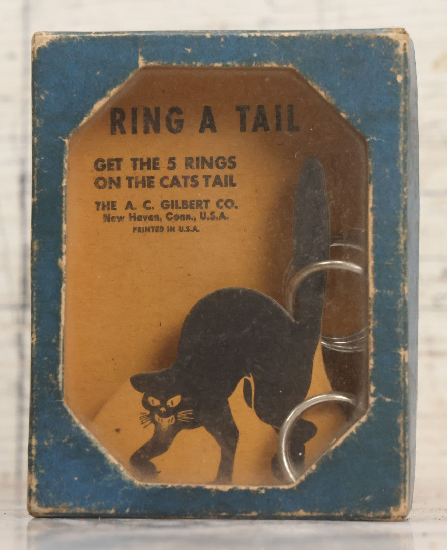 Lot 047 - Vintage "Ring A Tail" Black Cat Dexterity Game, "Get The Five Rings On The Cats Tail," Manufactured By The A.C. Gilbert Company, New Haven, Connecticut, Printed In U.S.A.