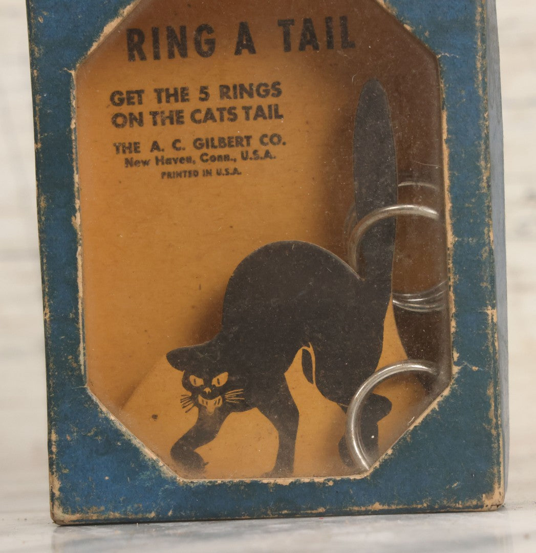 Lot 047 - Vintage "Ring A Tail" Black Cat Dexterity Game, "Get The Five Rings On The Cats Tail," Manufactured By The A.C. Gilbert Company, New Haven, Connecticut, Printed In U.S.A.