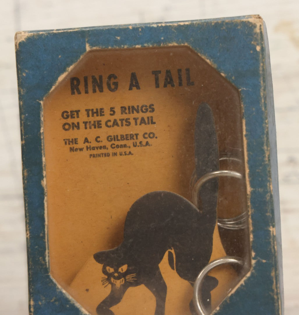 Lot 047 - Vintage "Ring A Tail" Black Cat Dexterity Game, "Get The Five Rings On The Cats Tail," Manufactured By The A.C. Gilbert Company, New Haven, Connecticut, Printed In U.S.A.