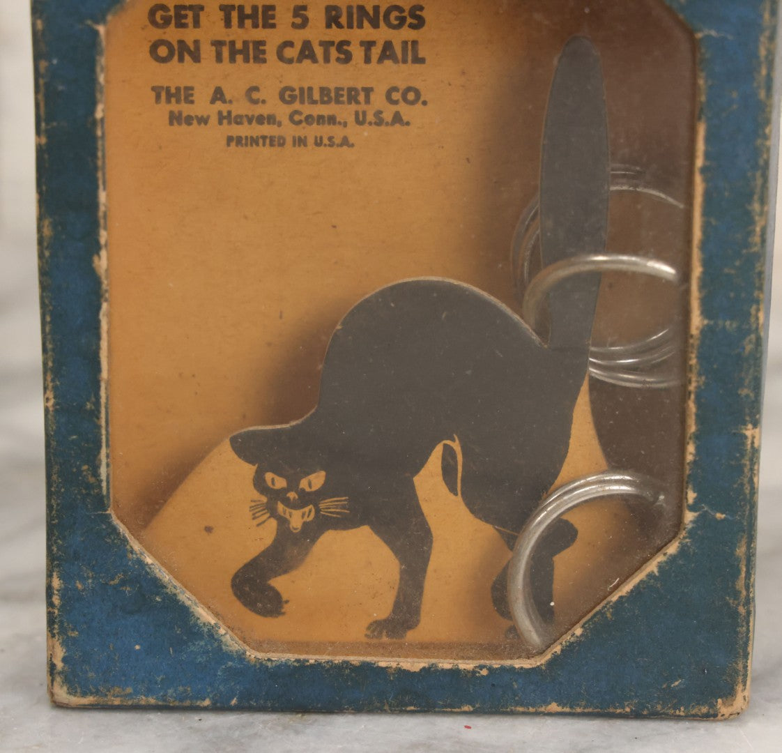 Lot 047 - Vintage "Ring A Tail" Black Cat Dexterity Game, "Get The Five Rings On The Cats Tail," Manufactured By The A.C. Gilbert Company, New Haven, Connecticut, Printed In U.S.A.
