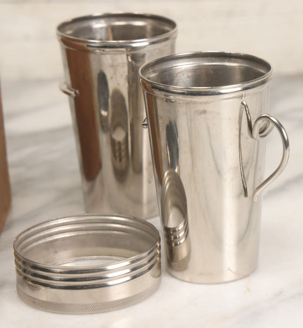 Lot 048 - Antique Thermos Brand Thermo Cup Set Of Four Plain Nickel Cups No. 79, With Original Box With Devil Graphics, Manufactured By The American Thermos Bottle Co., New York, Patented 1912, Complete Set