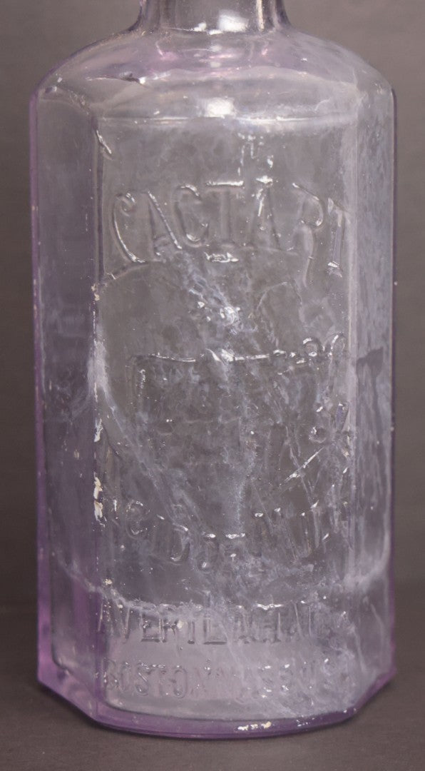 Lot 051 - Antique "Lactart" Acid Of Milk Purple Glass Medicine Bottle, Avery Lactate Co., Boston, Massachusetts, With Milkmaid And Cow Graphics