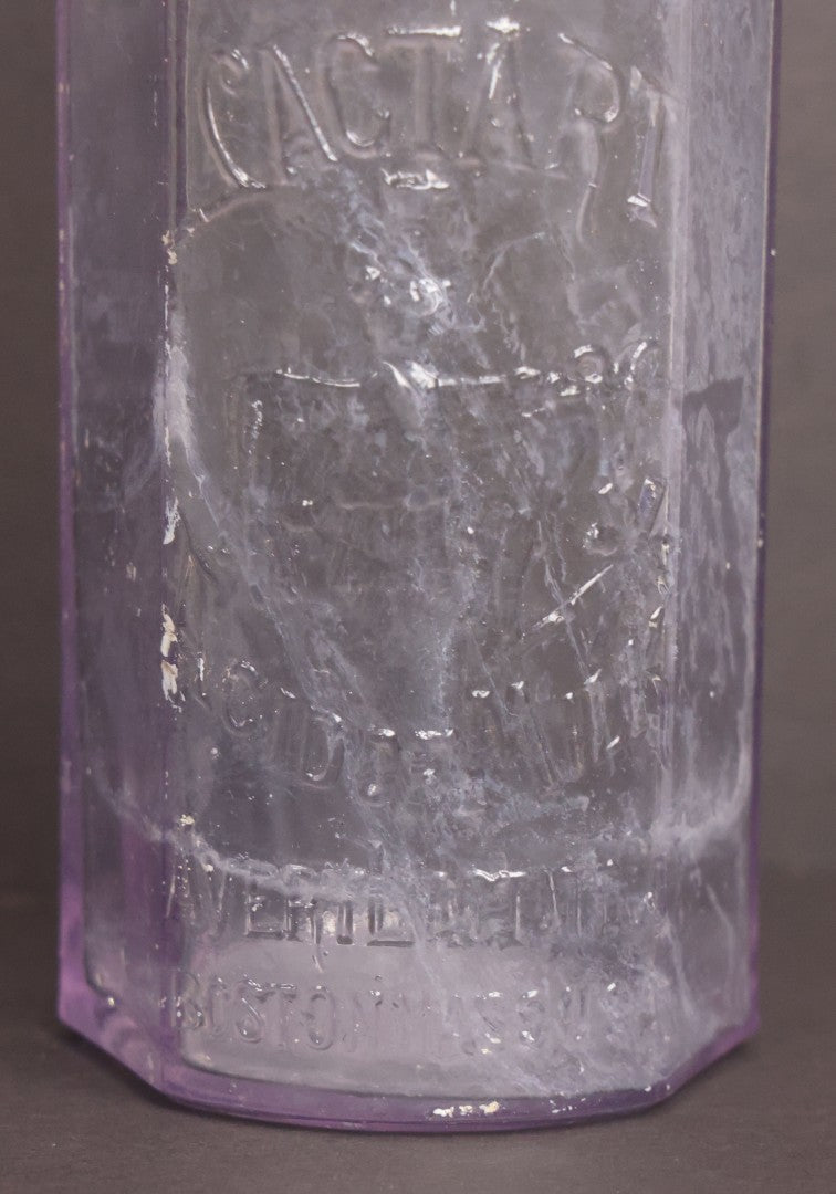 Lot 051 - Antique "Lactart" Acid Of Milk Purple Glass Medicine Bottle, Avery Lactate Co., Boston, Massachusetts, With Milkmaid And Cow Graphics