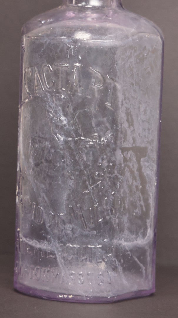 Lot 051 - Antique "Lactart" Acid Of Milk Purple Glass Medicine Bottle, Avery Lactate Co., Boston, Massachusetts, With Milkmaid And Cow Graphics