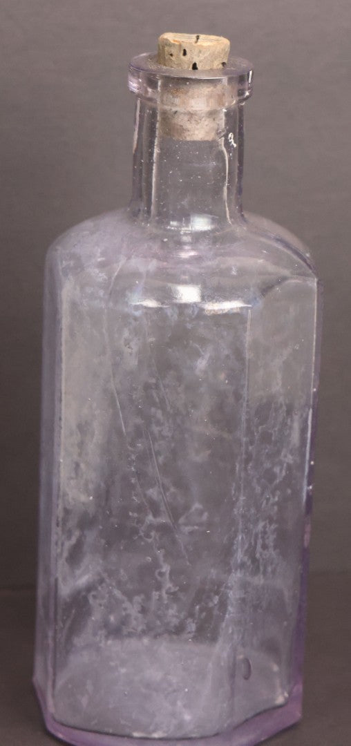 Lot 051 - Antique "Lactart" Acid Of Milk Purple Glass Medicine Bottle, Avery Lactate Co., Boston, Massachusetts, With Milkmaid And Cow Graphics