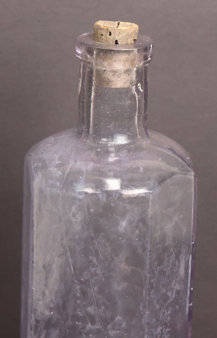 Lot 051 - Antique "Lactart" Acid Of Milk Purple Glass Medicine Bottle, Avery Lactate Co., Boston, Massachusetts, With Milkmaid And Cow Graphics