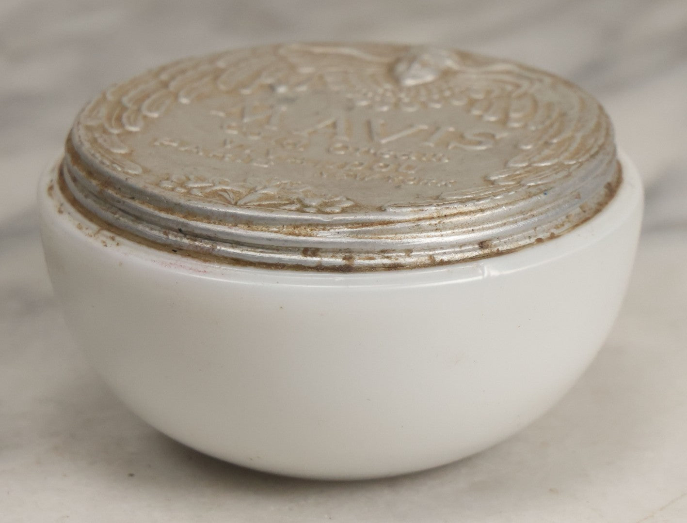 Lot 052 - Vintage Mavis Cold Cream Vivaudou Milk Glass Jar With Metal Art Deco Lid With Winged Woman Head, Paris And New York
