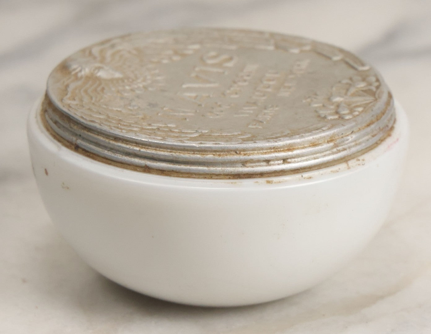 Lot 052 - Vintage Mavis Cold Cream Vivaudou Milk Glass Jar With Metal Art Deco Lid With Winged Woman Head, Paris And New York