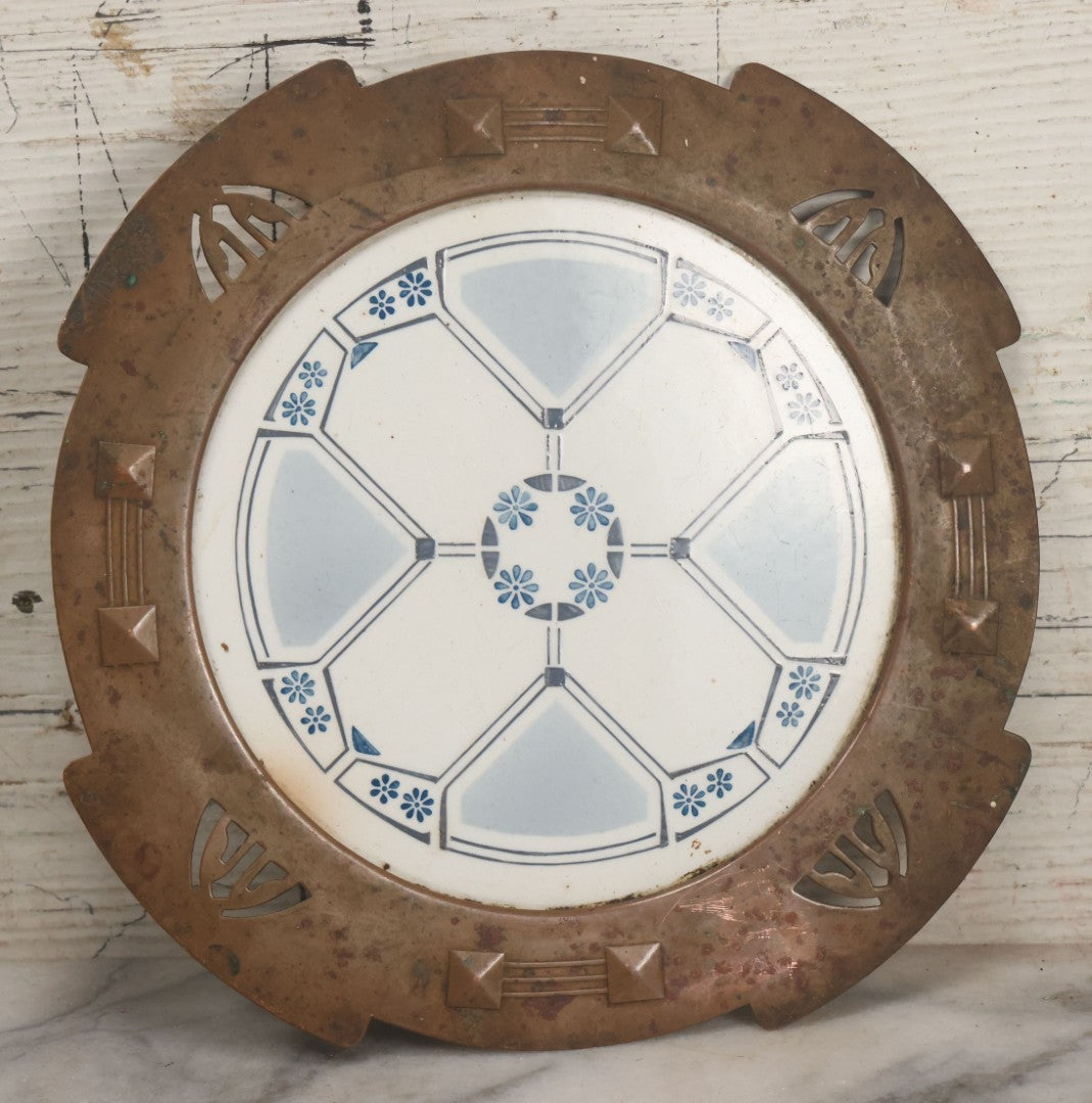Lot 056 - Antique Art Deco Trivet With Porcelain Center And Pressed Copper Surround, Note Scuffs, Scratches