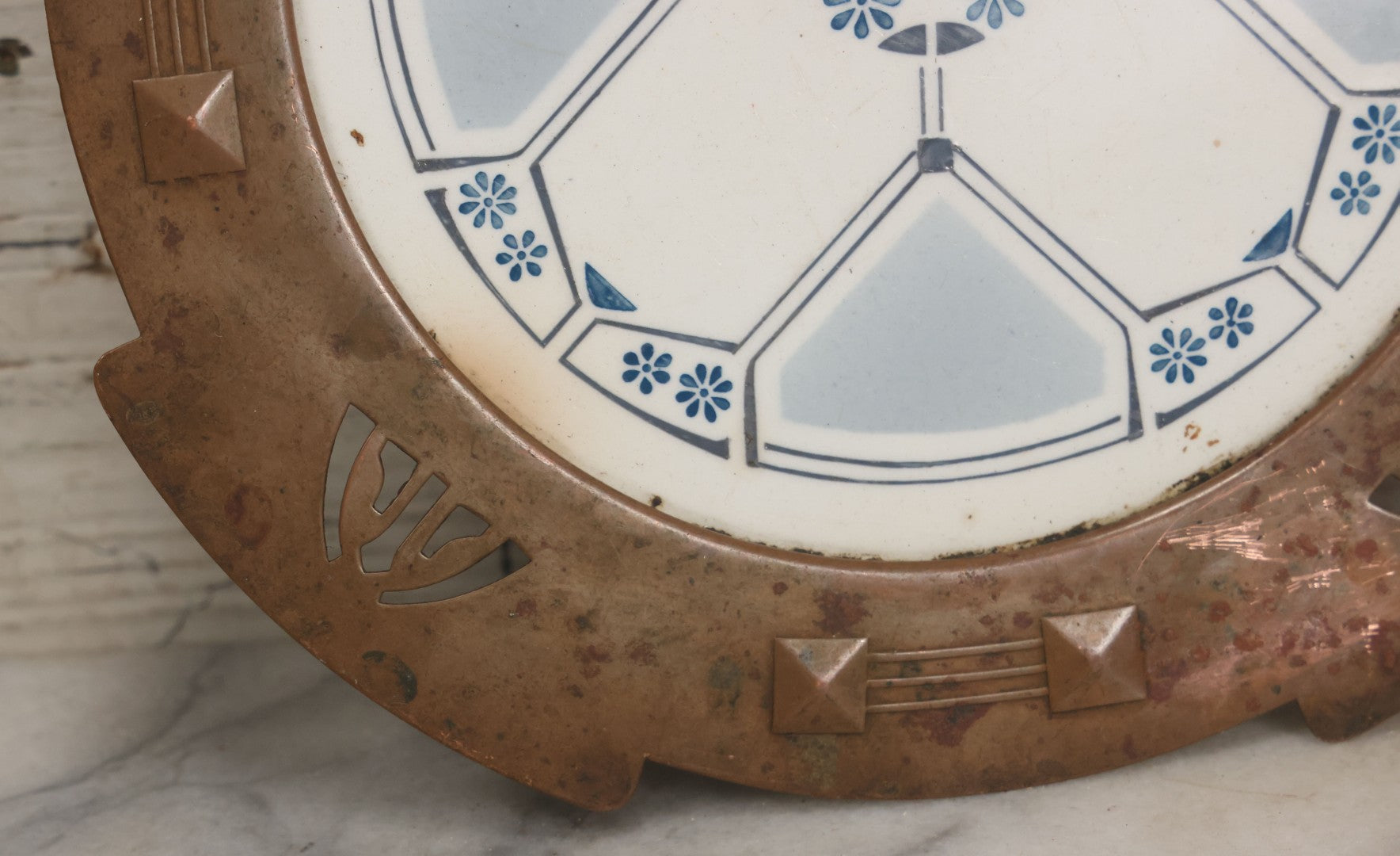 Lot 056 - Antique Art Deco Trivet With Porcelain Center And Pressed Copper Surround, Note Scuffs, Scratches