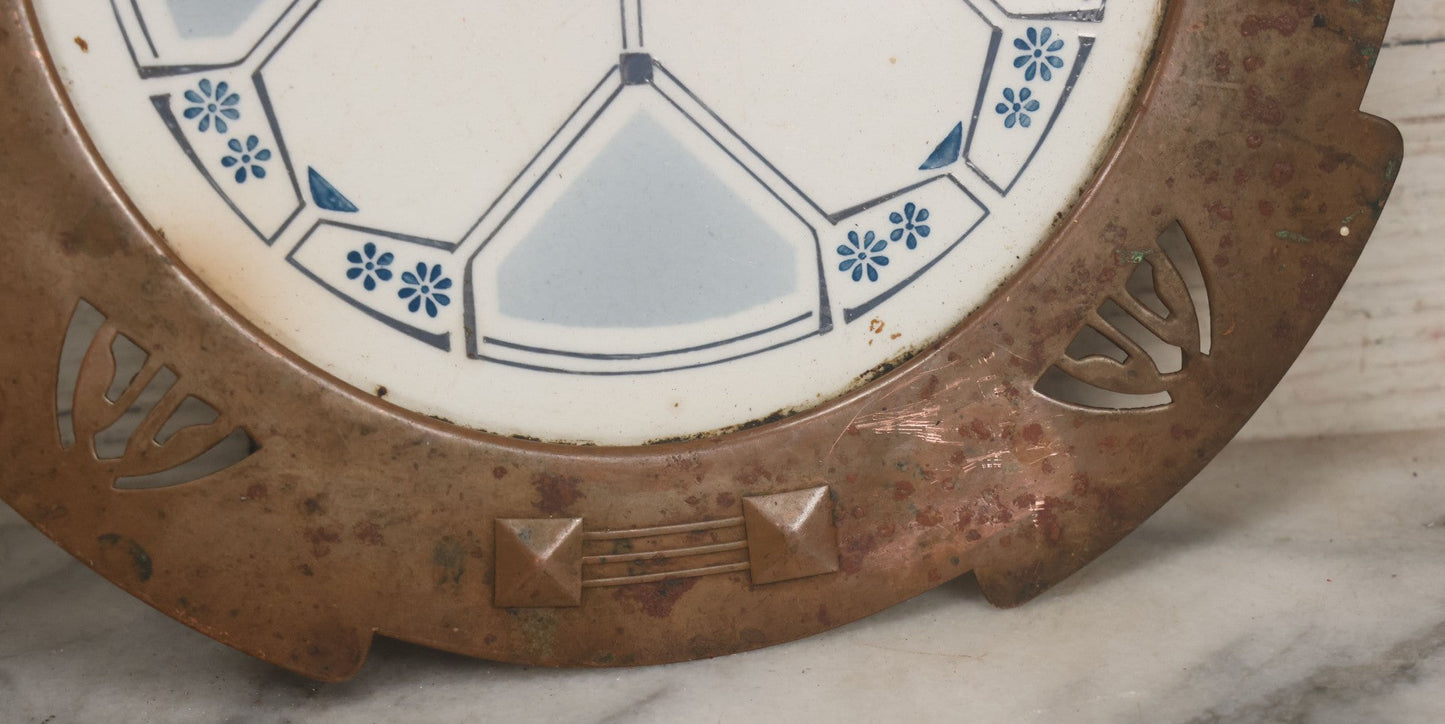 Lot 056 - Antique Art Deco Trivet With Porcelain Center And Pressed Copper Surround, Note Scuffs, Scratches