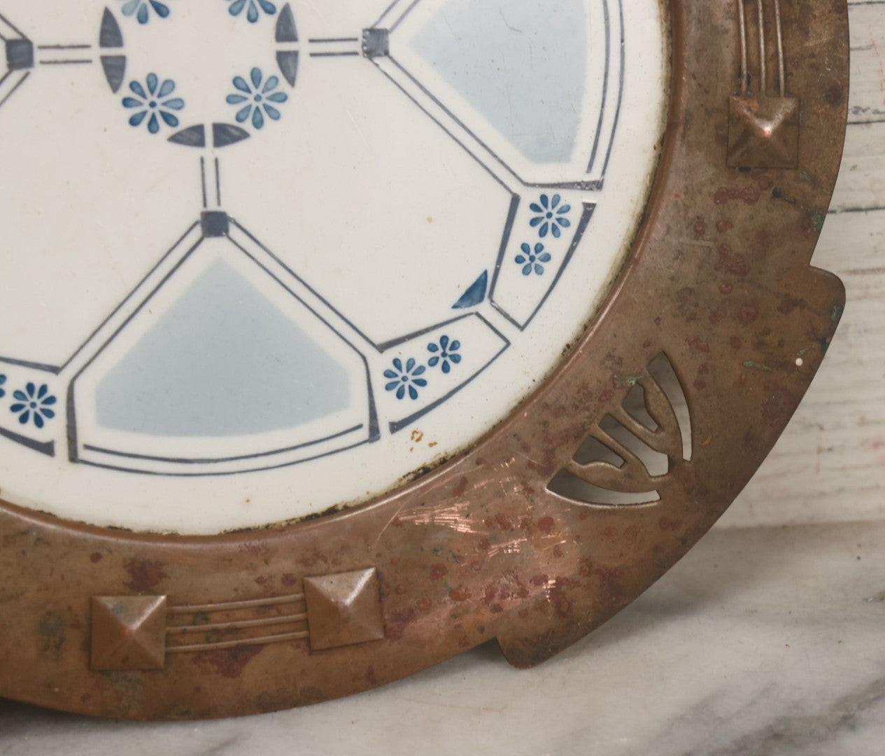 Lot 056 - Antique Art Deco Trivet With Porcelain Center And Pressed Copper Surround, Note Scuffs, Scratches